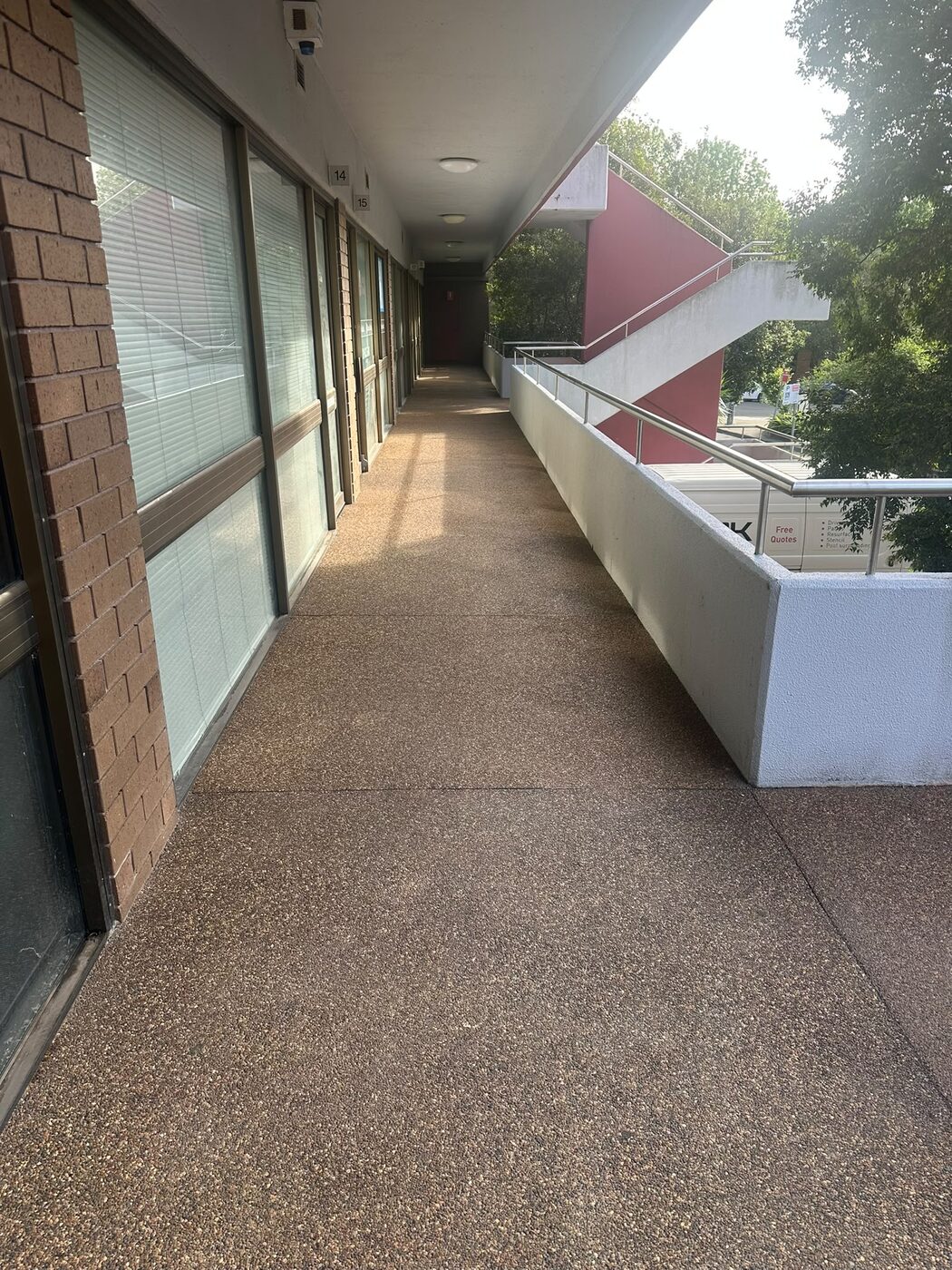 Ageing pebblecrete walkway at The Ashley Medical Centre Westmead before resurfacing