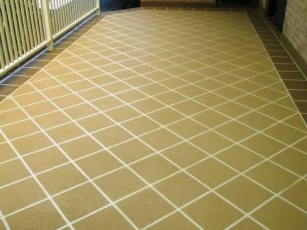 a brown floor with white lines
