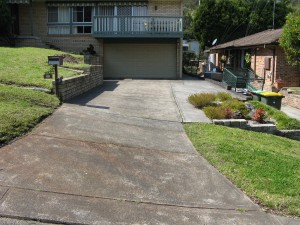 Before - a driveway leading to a house