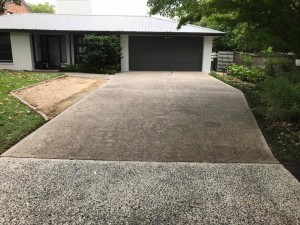 a driveway in front of a house