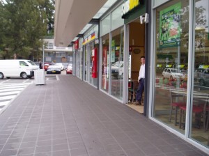 a person standing outside a store