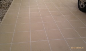 a tile floor with white grout