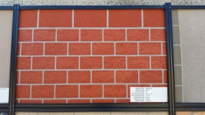 a brick wall with a sign